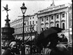 Watch Leisurely Pedestrians, Open Topped Buses and Hansom Cabs with Trotting Horses Afdah